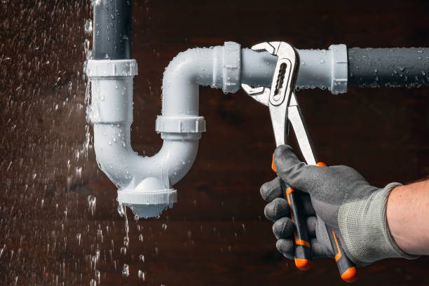 Professional Drain Cleaning technician working in Fort Drum, NY